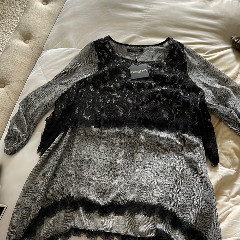 Fun, black lacy ladies top.
